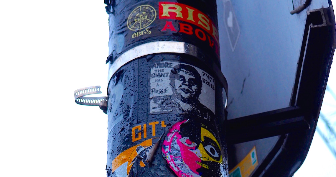 Shepard Fairey sticker on the lamppost