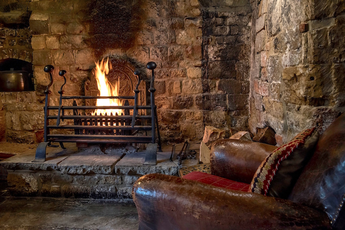 By the fire in the bar at The Howard Arms