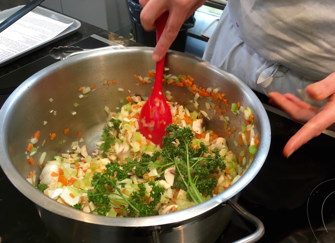 Making vegetable stock at Foodworks Cookery School Vegetarian Cookery Course