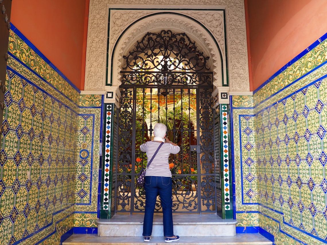 Through a locked gate on a Weekend in Seville