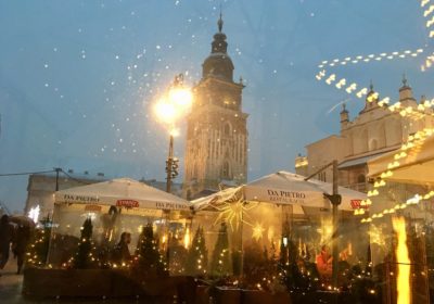 Covered cafes in the market square on a winter weekend in Krakow
